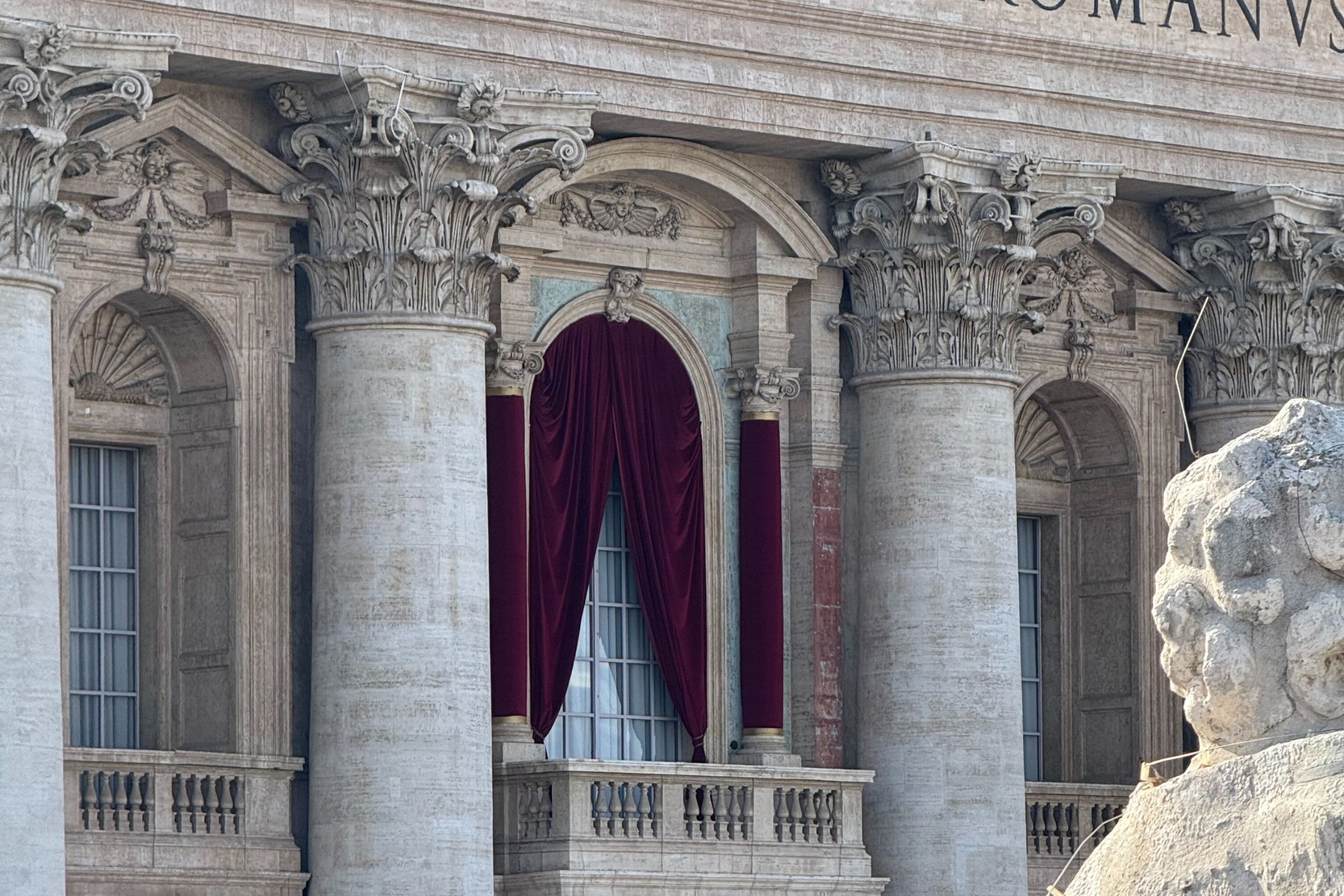 The balcony over the doors of St. Peter's Basilica overlooking the square